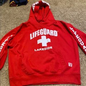 red lifeguard sweatshirt